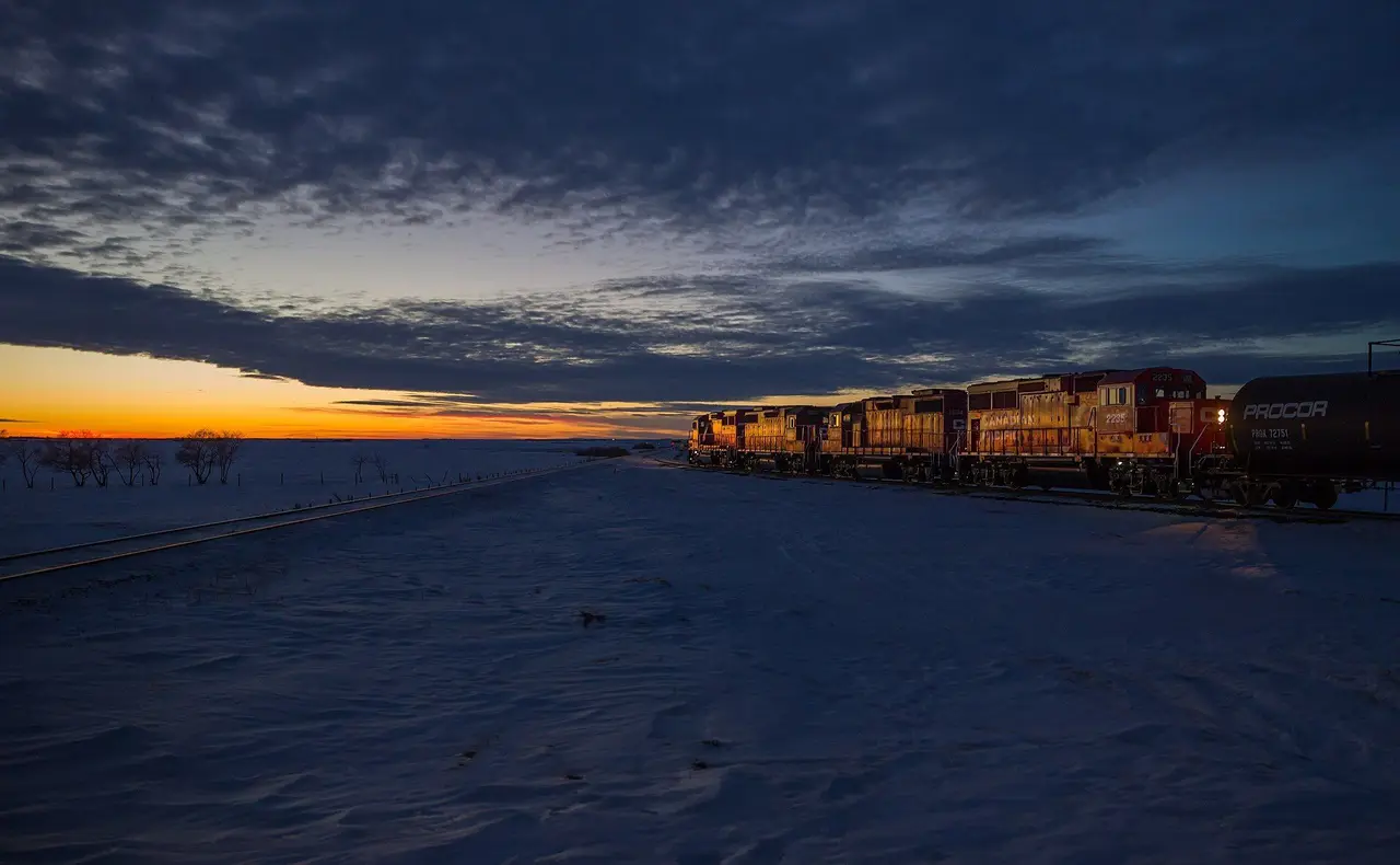 CP locomotives shunting tank cars at dusk near Wilkie, 2015